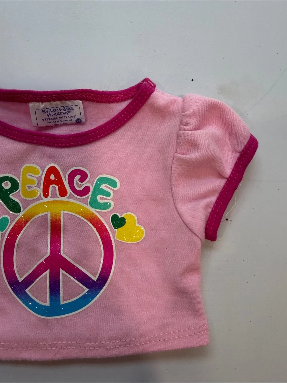 Build-a-bear pink peace sign shirt